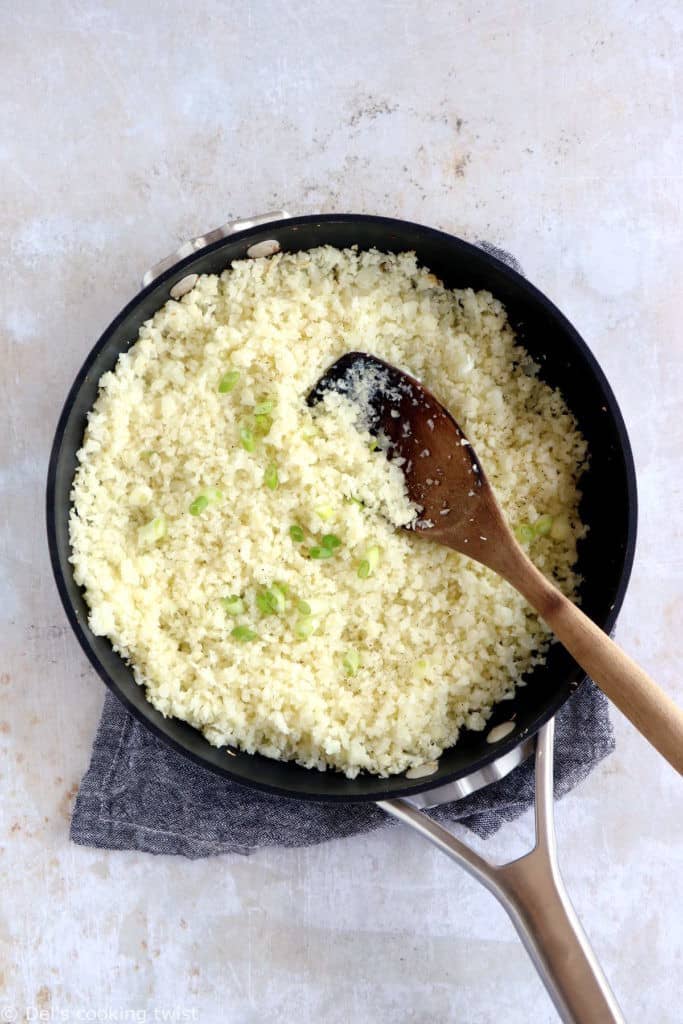 Quick and easy to prepare, this scrambled egg cauliflower fried rice makes for a healthier lunch, loaded with veggies, protein-rich, and naturally gluten-free.