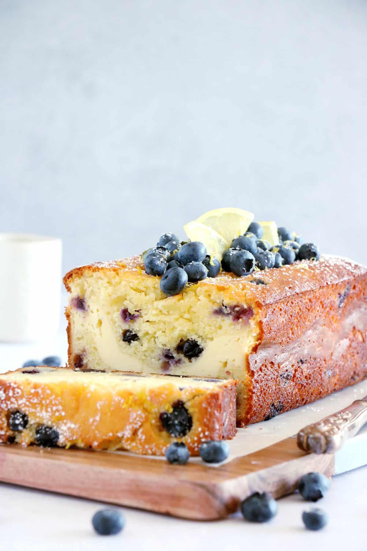 This cream cheese-filled lemon blueberry loaf is bursting with juicy blueberries and lemony flavors with a soft, tender crumb, and a very refreshing cream cheese center.