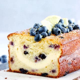 This cream cheese-filled lemon blueberry loaf is bursting with juicy blueberries and lemony flavors with a soft, tender crumb, and a very refreshing cream cheese center.