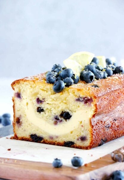 This cream cheese-filled lemon blueberry loaf is bursting with juicy blueberries and lemony flavors with a soft, tender crumb, and a very refreshing cream cheese center.