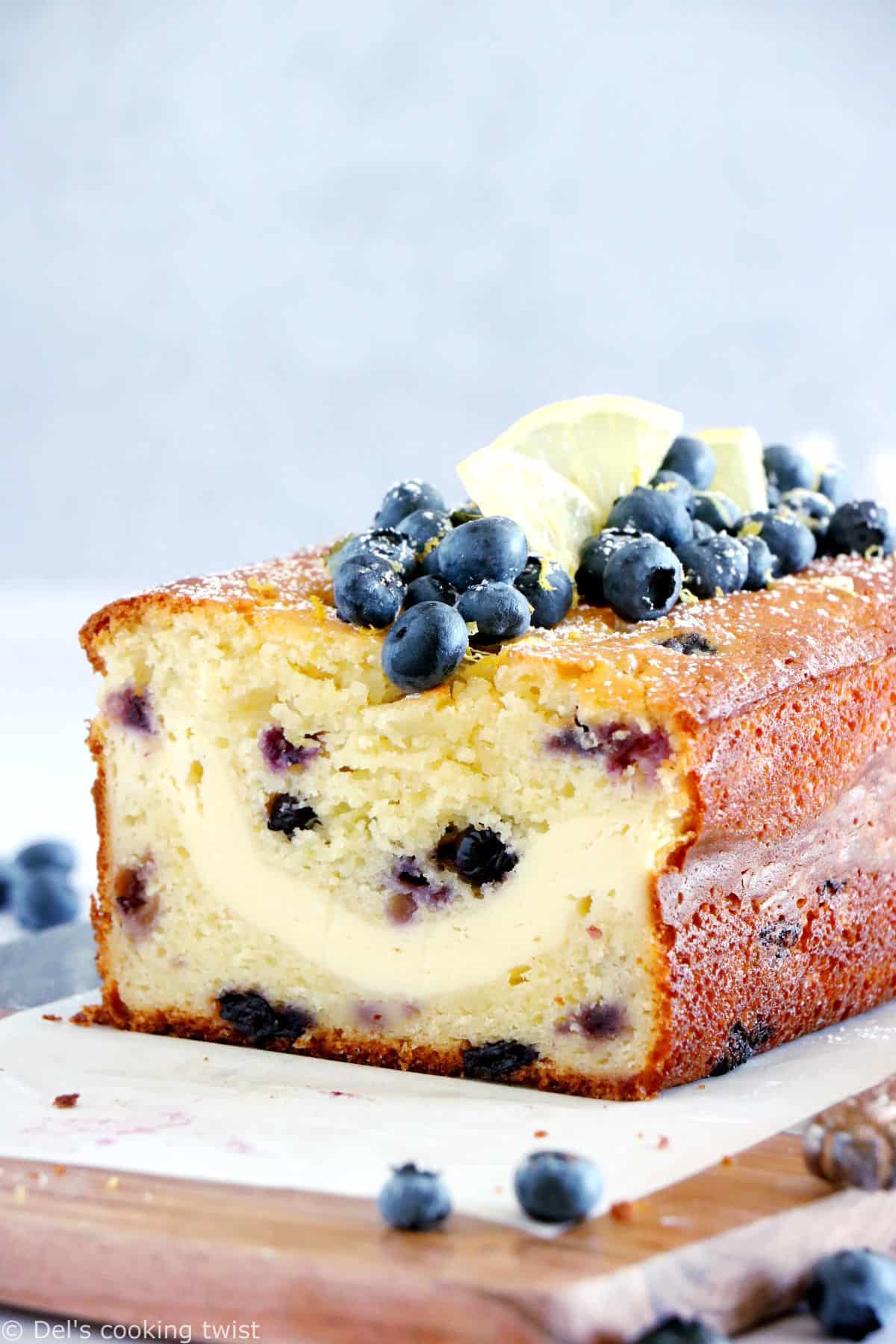 This cream cheese-filled lemon blueberry loaf is bursting with juicy blueberries and lemony flavors with a soft, tender crumb, and a very refreshing cream cheese center.