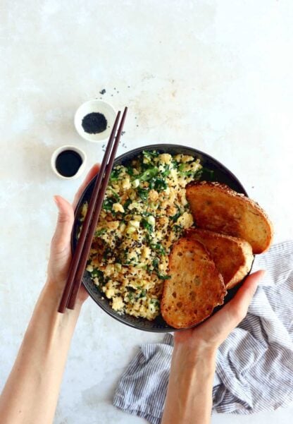 Quick and easy to prepare, this scrambled egg cauliflower fried rice makes for a healthier lunch, loaded with veggies, protein-rich, and naturally gluten-free.