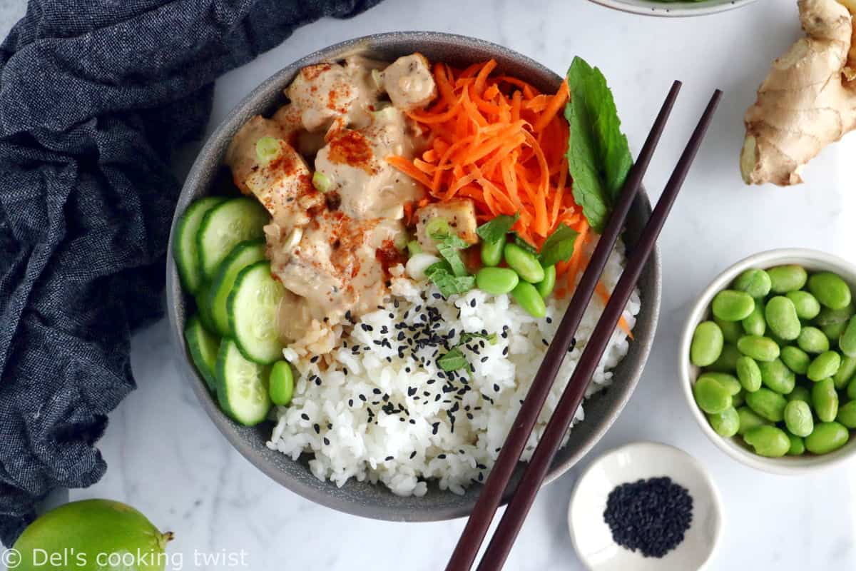 This easy spicy peanut tofu power bowl is vegan, gluten-free, high in plant-based protein and packed with good-for-you ingredients.