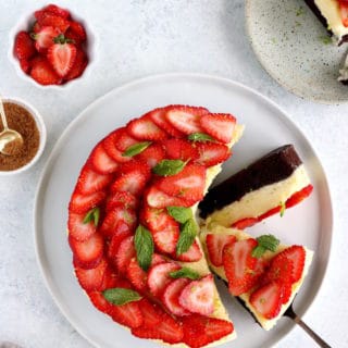 This strawberry white chocolate cheesecake brownies features a rich chocolate base, a creamy white chocolate center, and some fresh berries.