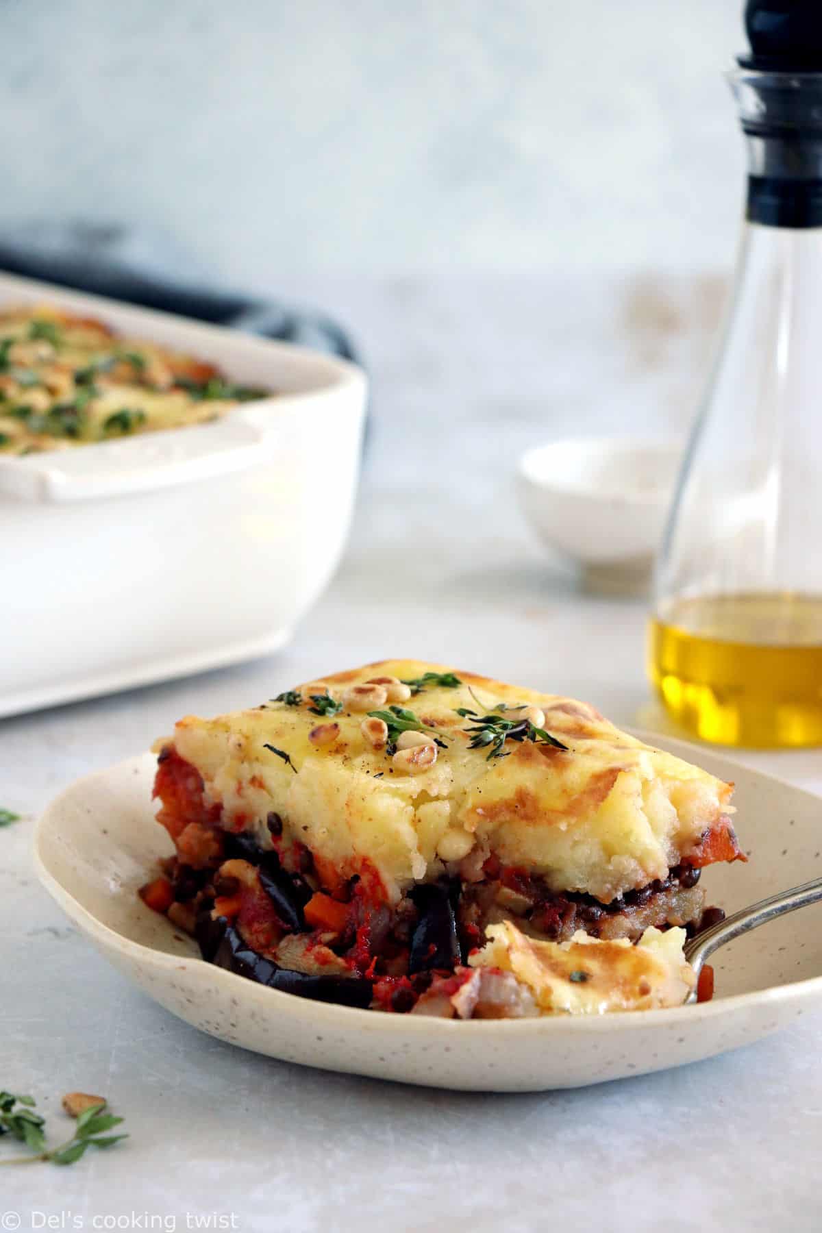 This vegetarian moussaka has some deep smoky flavors, with layers of eggplants, potatoes, spiced vegetarian meat, and a creamy bechamel sauce.