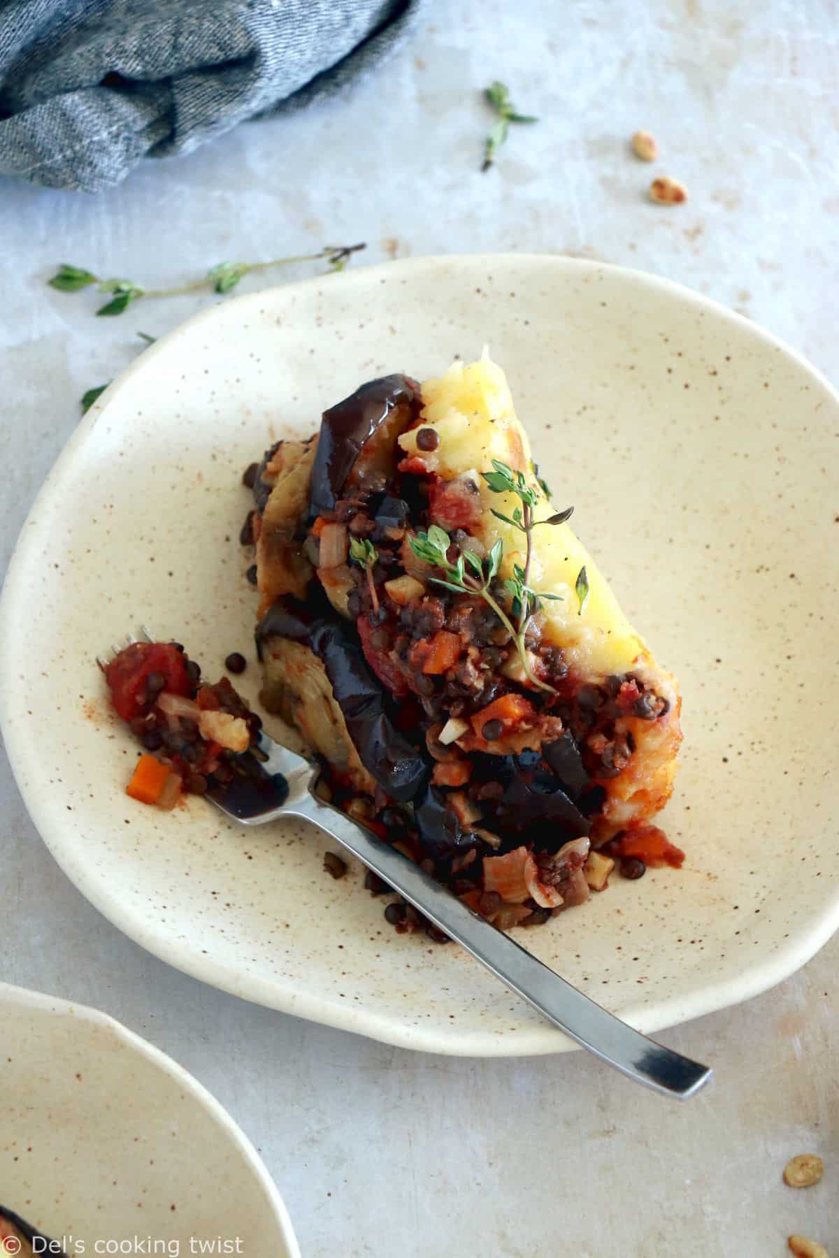 This vegetarian moussaka has some deep smoky flavors, with layers of eggplants, potatoes, spiced vegetarian meat, and a creamy bechamel sauce.