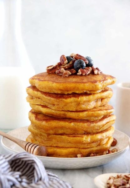 Perfect pumpkin pancakes are fluffy, moist and generous, and prepared with real pumpkin puree and warm pumpkin pie spices.