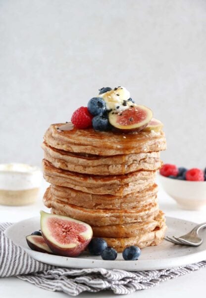 Wake up to a healthy breakfast with these whole wheat pancakes. Prepared with just a handful of simple ingredients, these pancakes are super fluffy, extra thick, and perfectly moist, with a subtle nutty flavor.