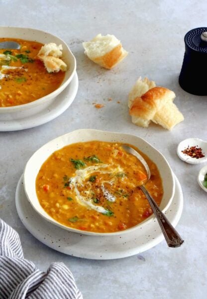 This curried red lentil and split pea soup is easy to make, loaded with warm and comforting flavors, with just a little bit of texture to it.