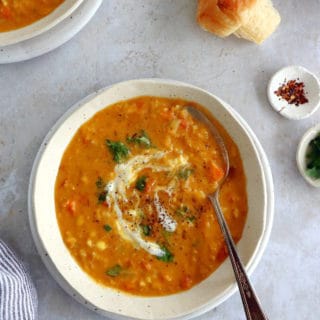 This curried red lentil and split pea soup is easy to make, loaded with warm and comforting flavors, with just a little bit of texture to it.