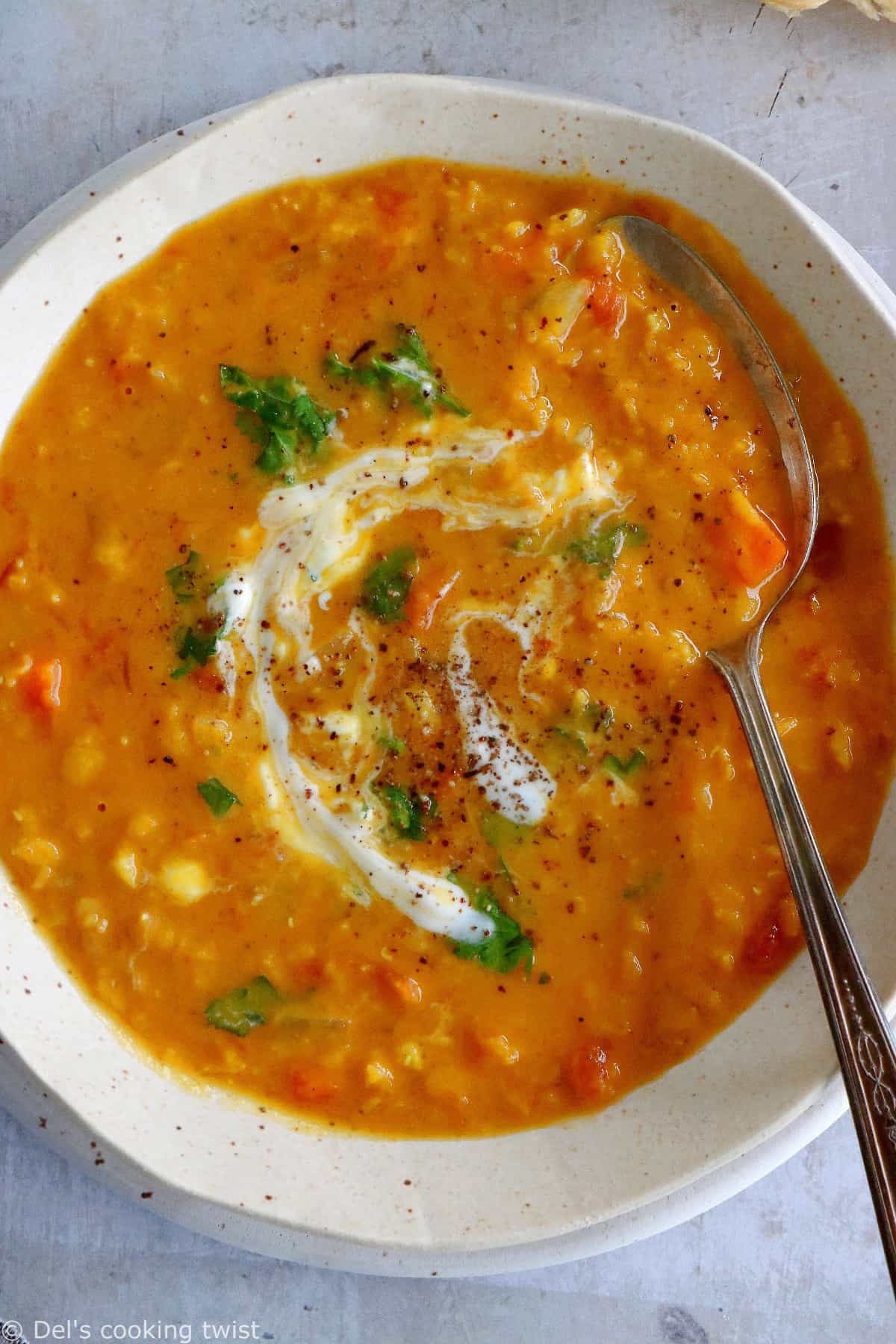 This curried red lentil and split pea soup is easy to make, loaded with warm and comforting flavors, with just a little bit of texture to it.