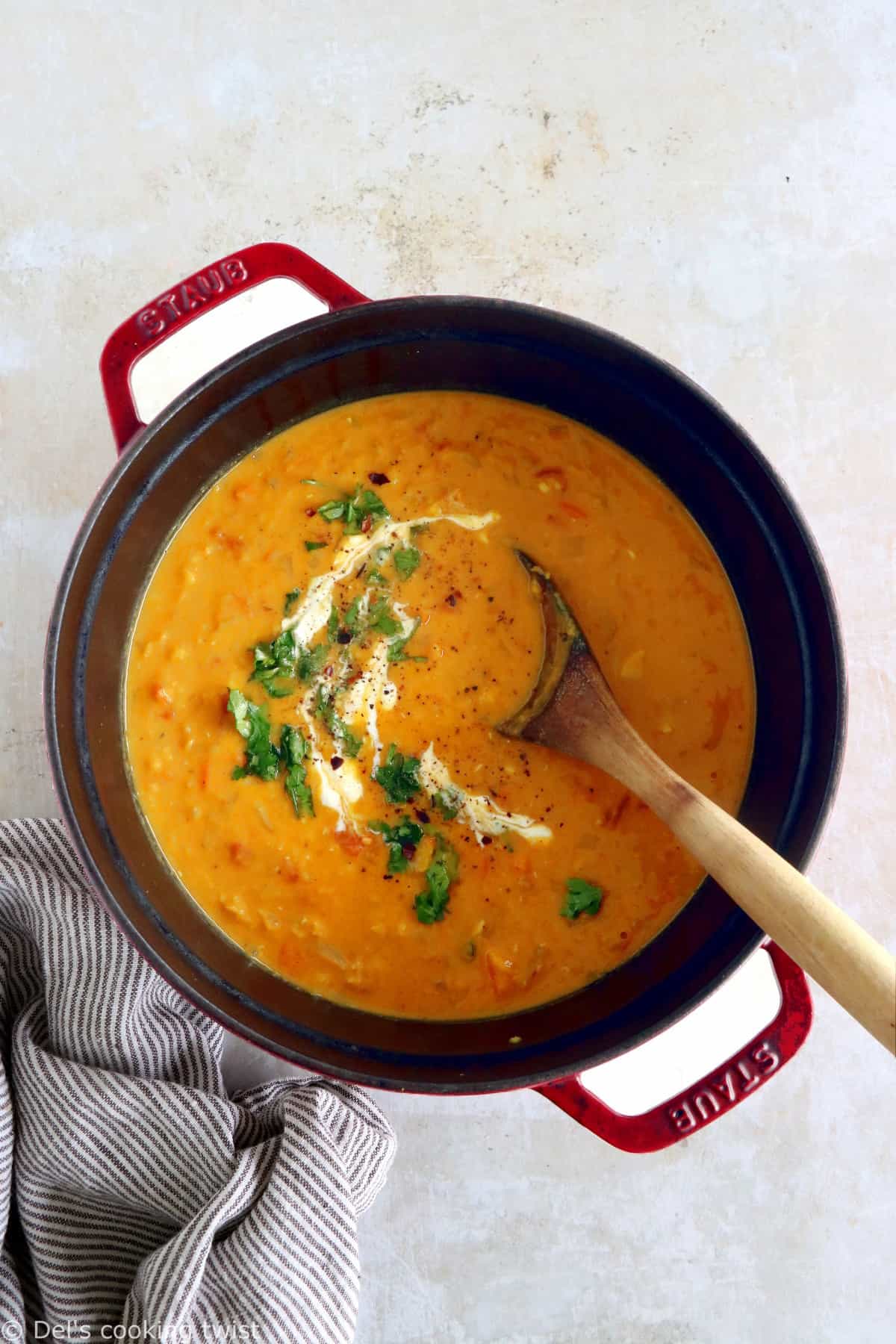 This curried red lentil and split pea soup is easy to make, loaded with warm and comforting flavors, with just a little bit of texture to it.