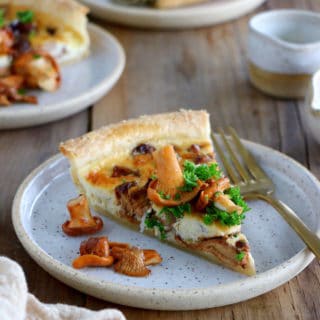 Chanterelle mushroom tart is a traditional Swedish recipe prepared with fresh chanterelles and Västerbotten grated cheese.