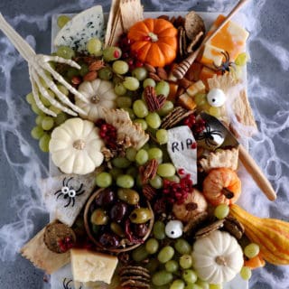 This killer vegetarian Halloween grazing board is a fun and spooky way to get you into the Halloween spirit.