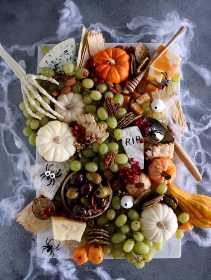 This killer vegetarian Halloween grazing board is a fun and spooky way to get you into the Halloween spirit.