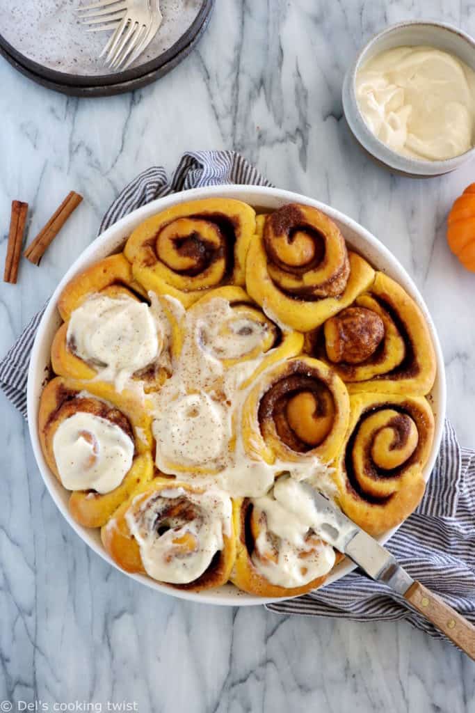 These pumpkin cinnamon rolls are soft, pillowy, prepared with real pumpkin puree, and loaded with warm pumpkin spice.