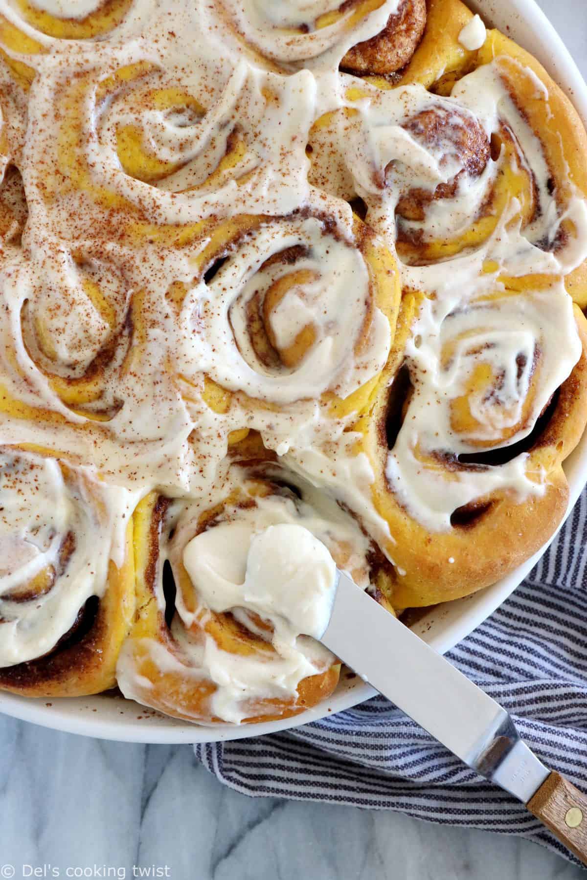 These pumpkin cinnamon rolls are soft, pillowy, prepared with real pumpkin puree, and loaded with warm pumpkin spice.