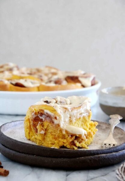 These pumpkin cinnamon rolls are soft, pillowy, prepared with real pumpkin puree, and loaded with warm pumpkin spice.