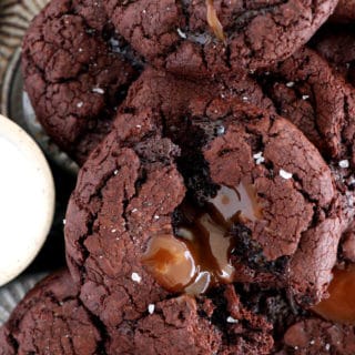 Salted caramel stuffed brownie cookies are slightly crinkly on top, fudgy, loaded with chocolate, with a gooey salted caramel center.