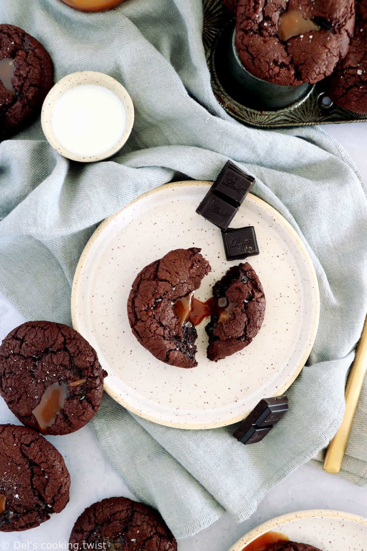 Salted caramel stuffed brownie cookies are slightly crinkly on top, fudgy, loaded with chocolate, with a gooey salted caramel center.