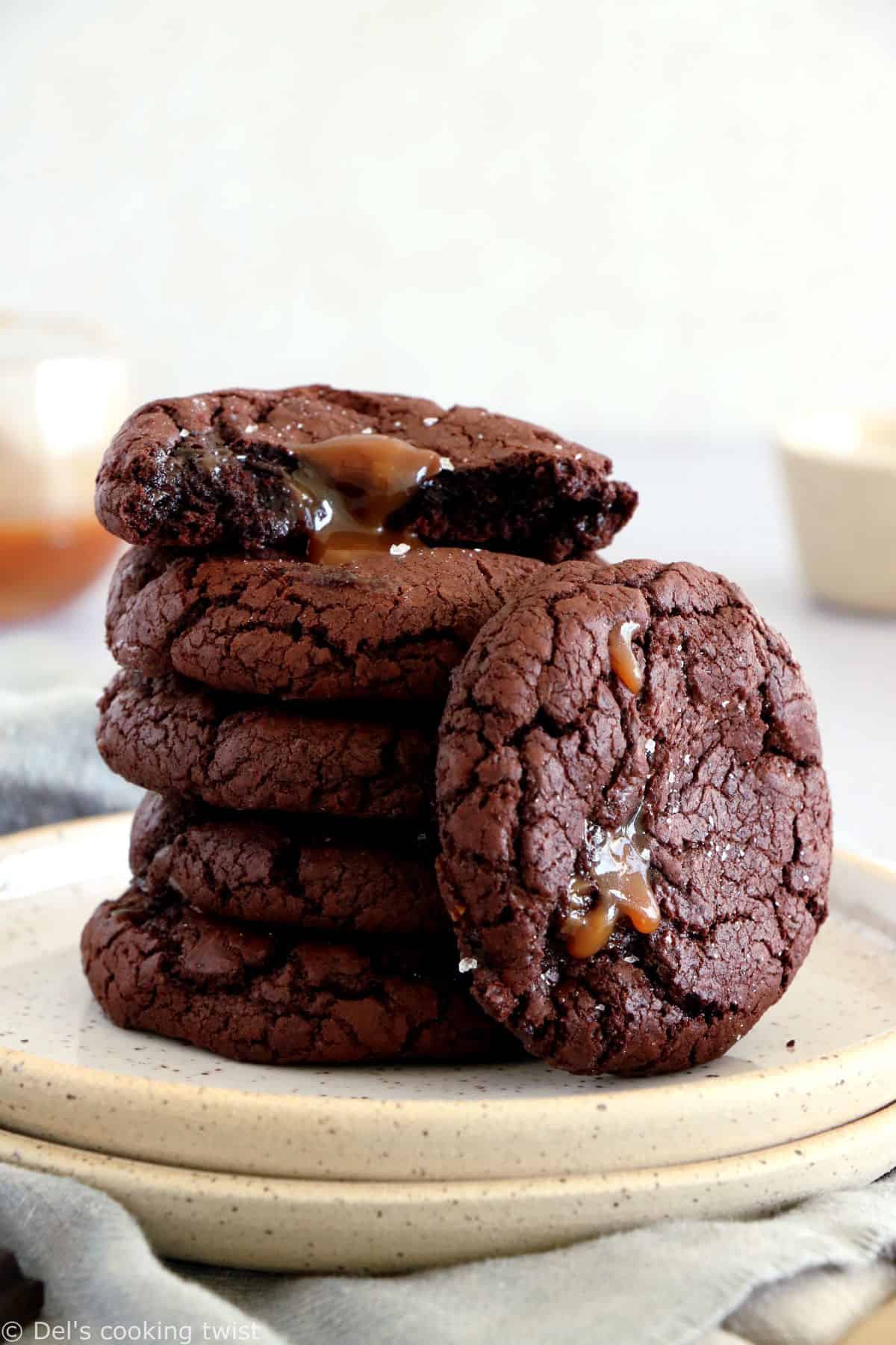 Salted caramel stuffed brownie cookies are slightly crinkly on top, fudgy, loaded with chocolate, with a gooey salted caramel center.