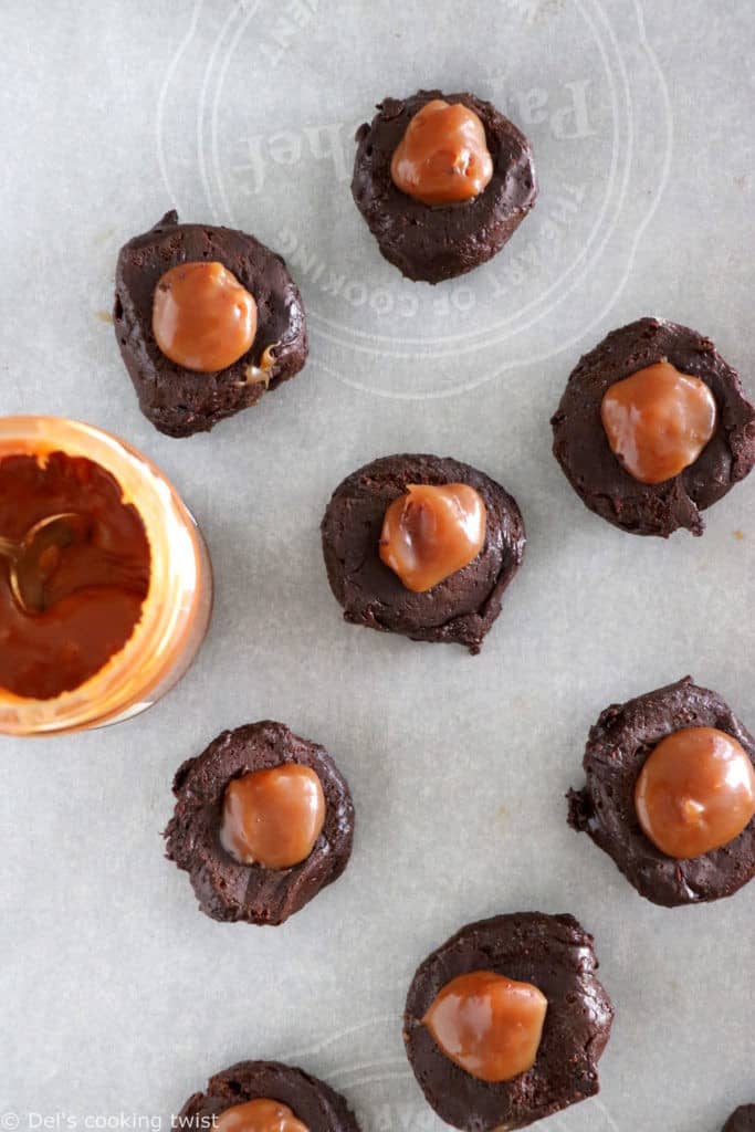 Salted caramel stuffed brownie cookies are slightly crinkly on top, fudgy, loaded with chocolate, with a gooey salted caramel center.