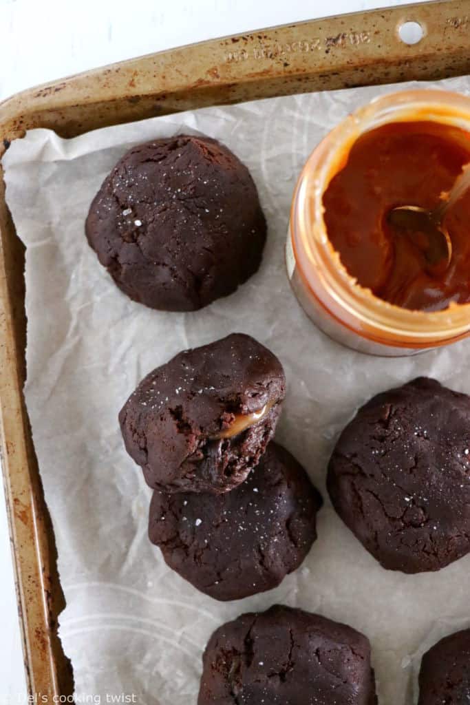 Salted caramel stuffed brownie cookies are slightly crinkly on top, fudgy, loaded with chocolate, with a gooey salted caramel center.