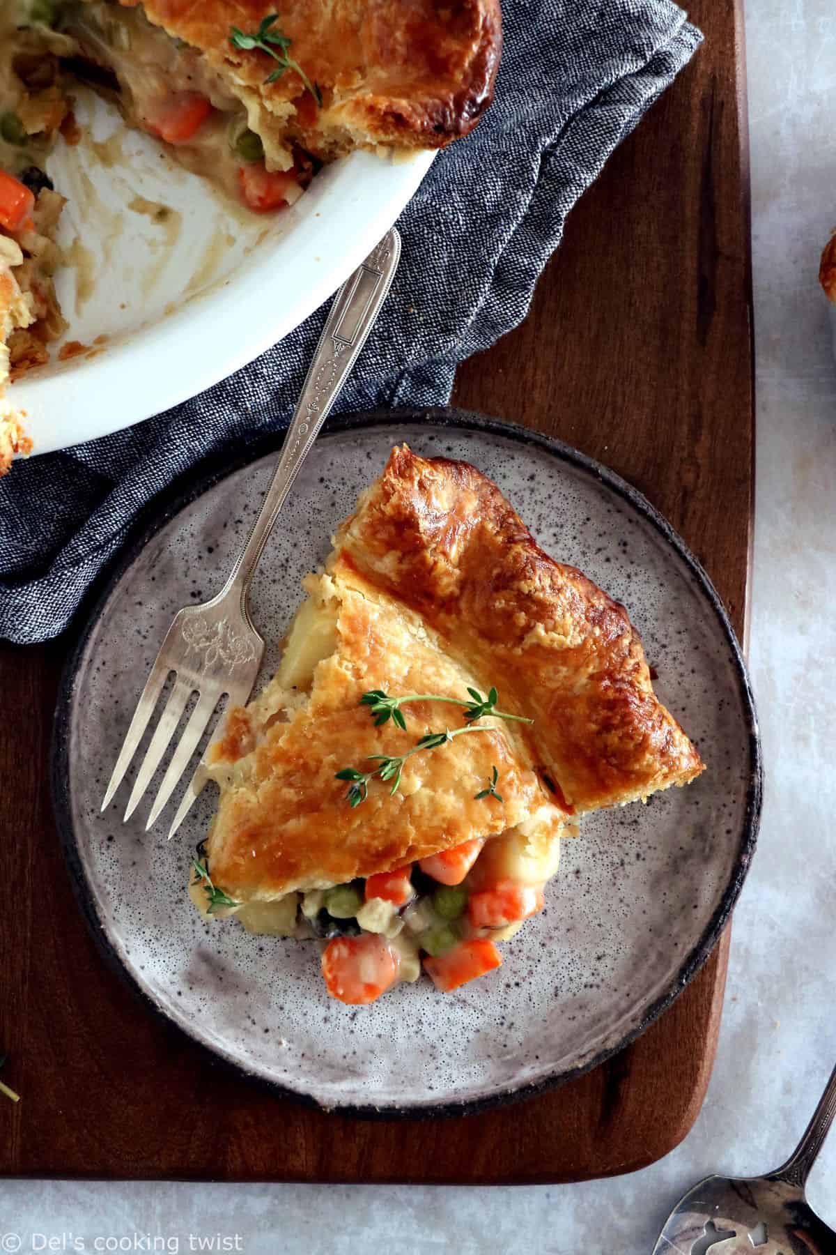 A rustic vegetarian pot pie loaded with hearty veggies coated in a creamy gravy, and tucked in between two crunchy flaky pie crusts.