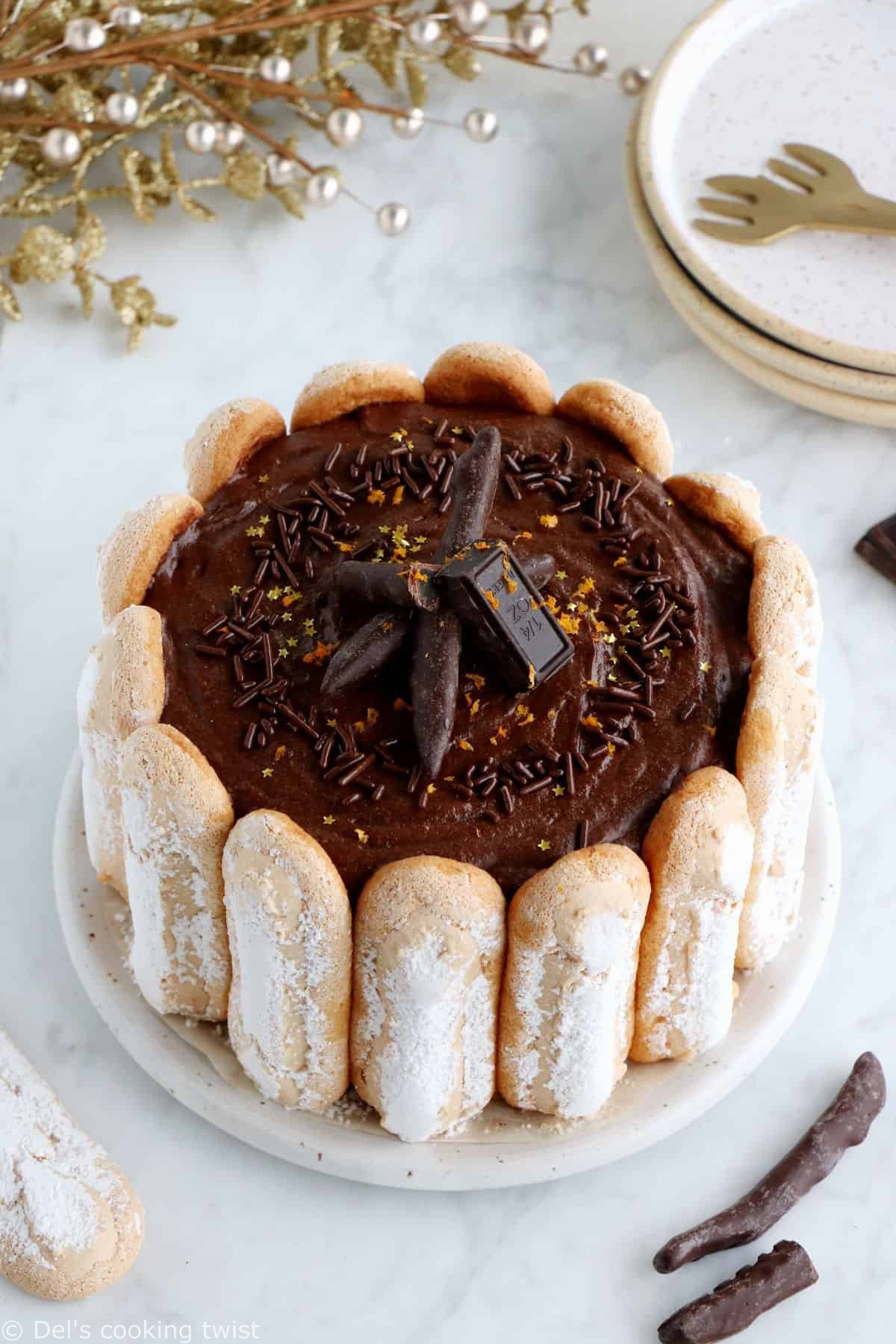 The French chocolate charlotte is an elegant no-bake dessert featuring Ladyfingers and a rich chocolate mousse.