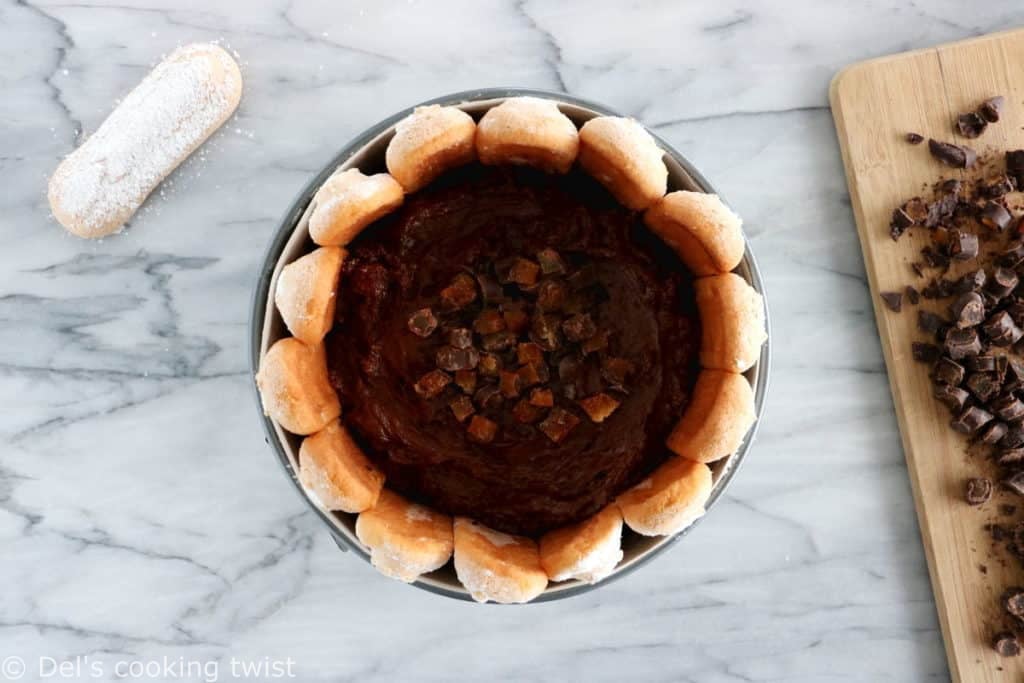 The French chocolate charlotte is an elegant no-bake dessert featuring Ladyfingers and a rich chocolate mousse.