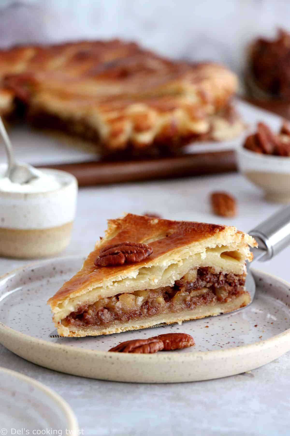 This apple pecan galette des rois is a wonderful twist on the classic French dessert galette des rois usually prepared with frangipane and served for the Epiphany.