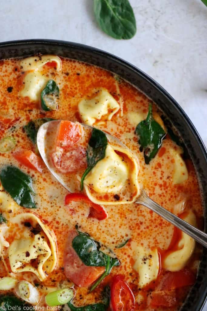 Thai red curry tortellini soup is fusion food at its finest, resulting from Thai cuisine meeting the Italian one.