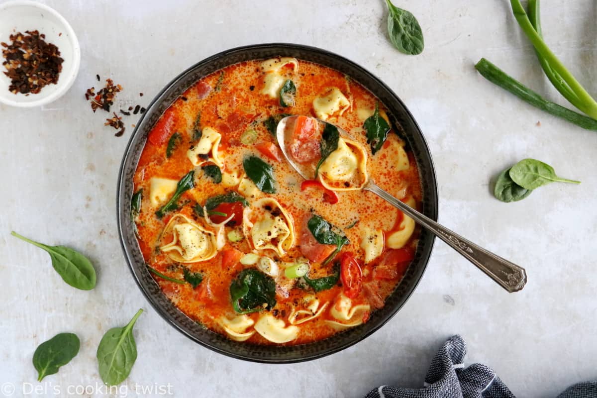 Thai red curry tortellini soup is fusion food at its finest, resulting from Thai cuisine meeting the Italian one.