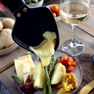 Learn how to host a vegetarian raclette dinner party at home, with veggie suggestions and how to prepare them, playing with spices and other add-ons to make it a feast!