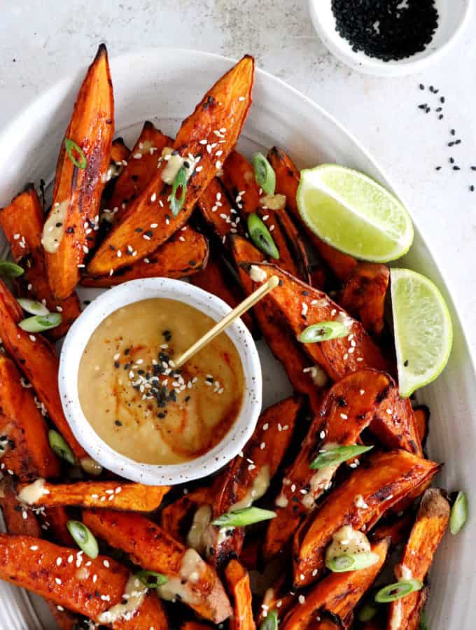 These miso roasted sweet potatoes are super crispy, spicy, sweet, and served with an incredible Japanese-inspired miso sauce, loaded with umami flavors.