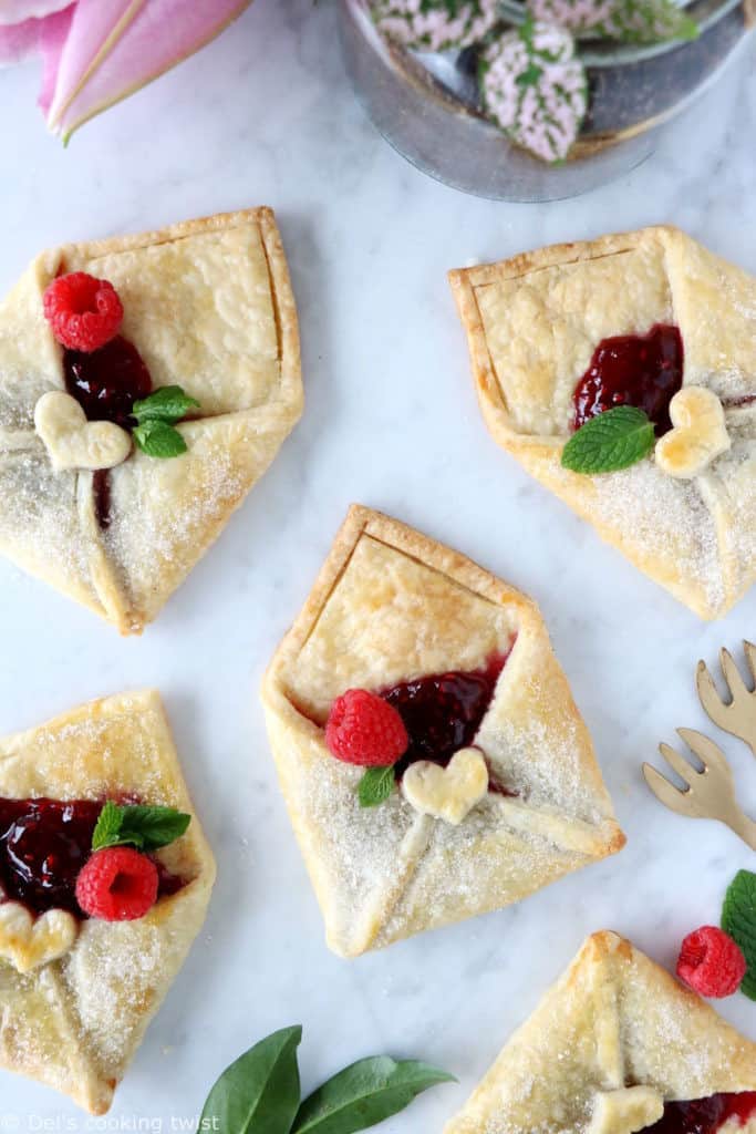 These adorable raspberry pie pastry envelopes are mini pies folded like an envelope, and filled with a delicious raspberry jam.