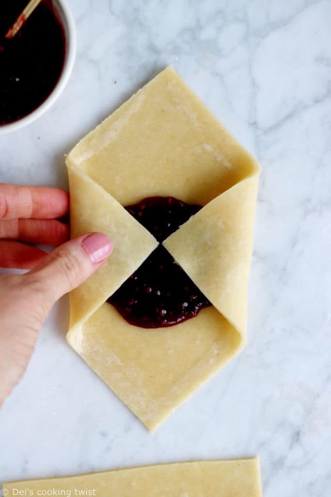 These adorable raspberry pie pastry envelopes are mini pies folded like an envelope, and filled with a delicious raspberry jam.