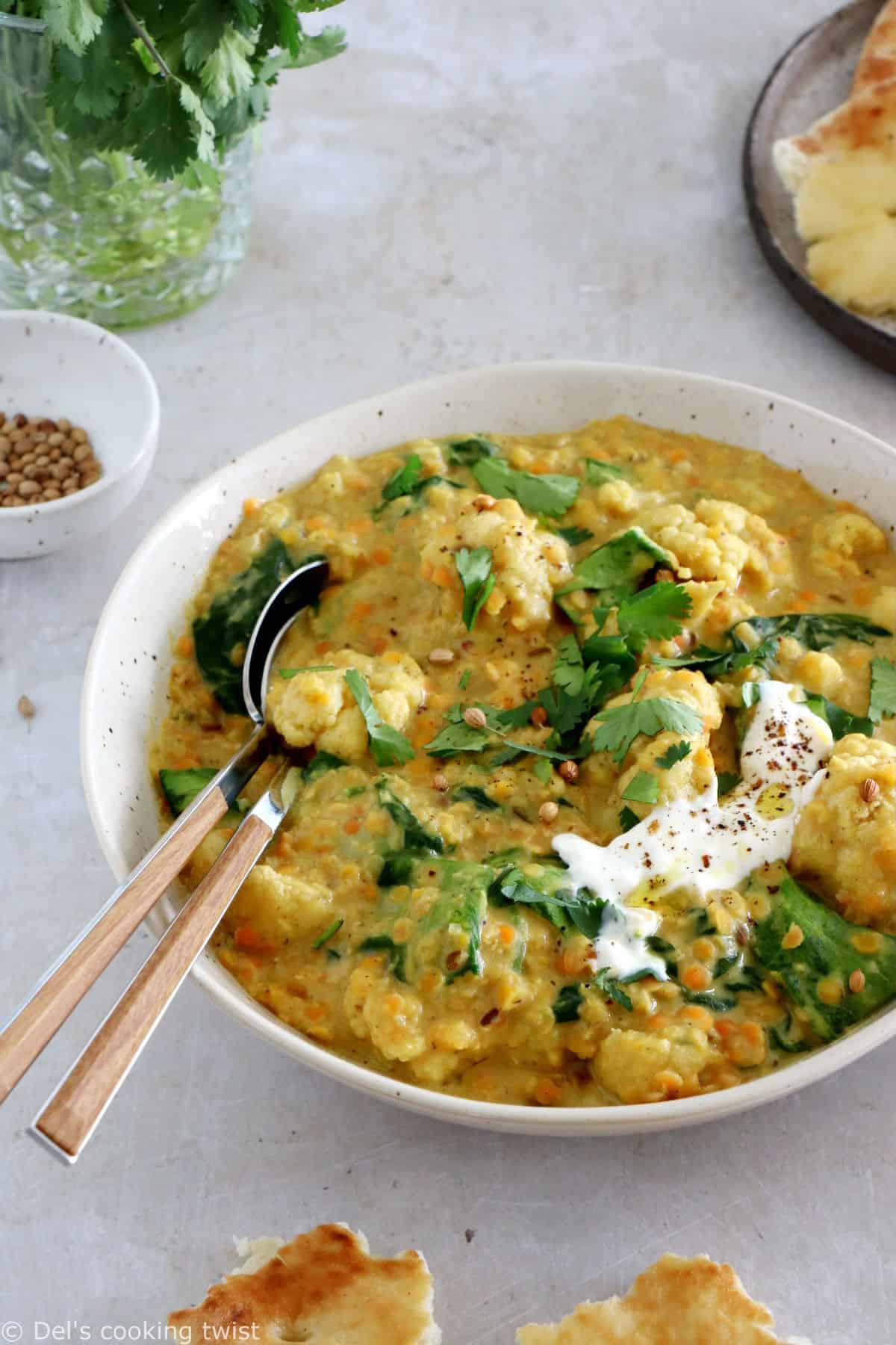 This roasted cauliflower dal is a comforting and satisfying Indian stew, prepared with red lentils, coconut milk, and golden roasted cauliflower.