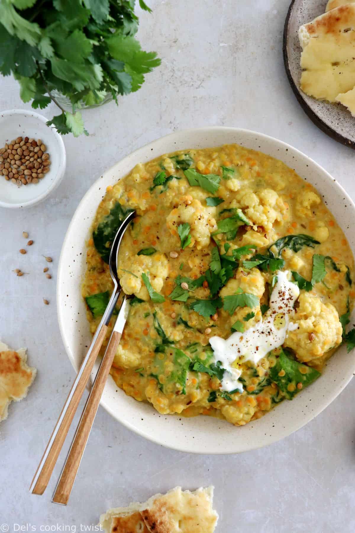 This roasted cauliflower dal is a comforting and satisfying Indian stew, prepared with red lentils, coconut milk, and golden roasted cauliflower.