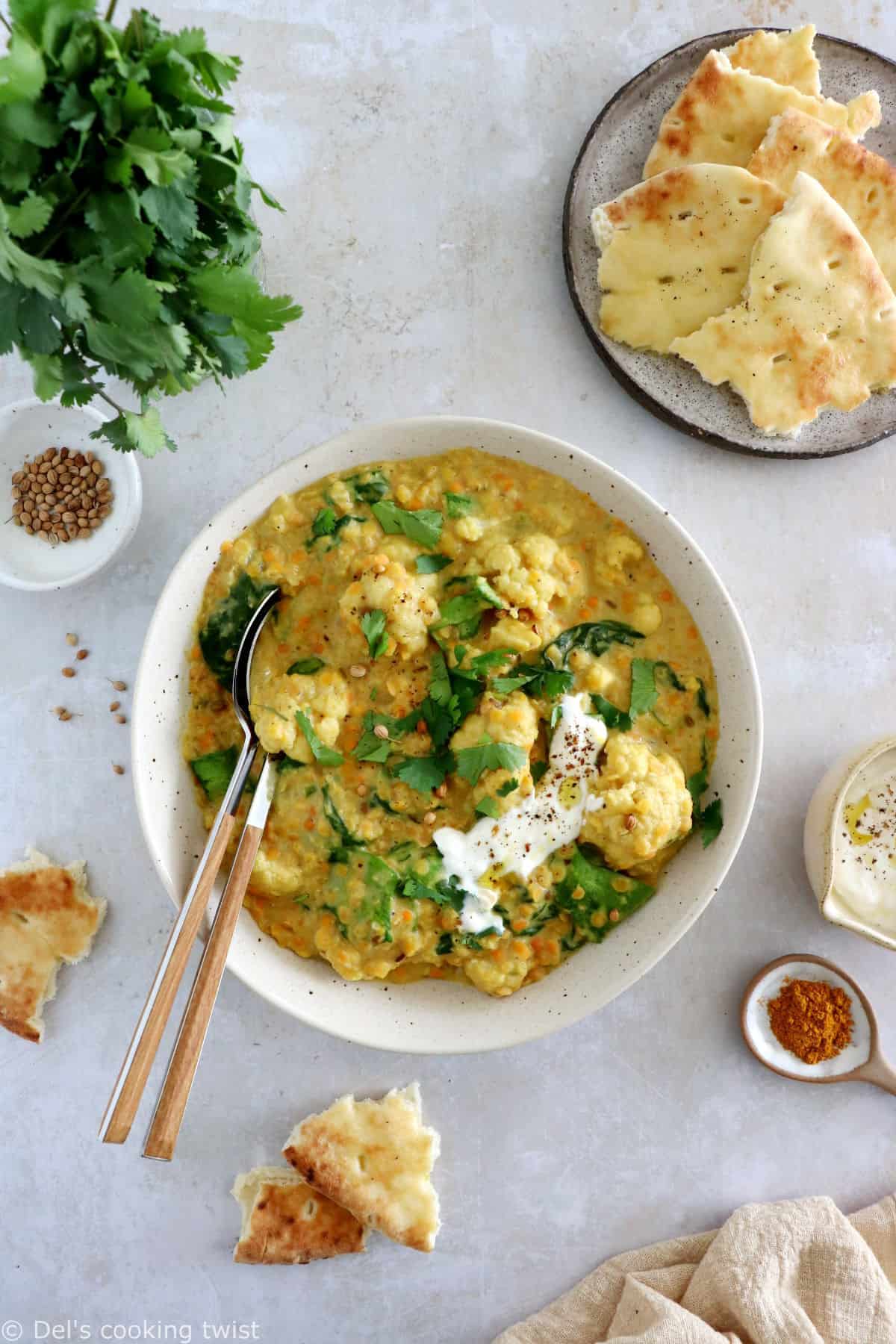 This roasted cauliflower dal is a comforting and satisfying Indian stew, prepared with red lentils, coconut milk, and golden roasted cauliflower.