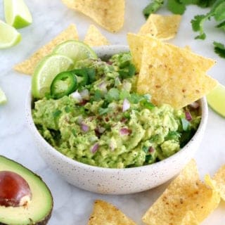 This is hands down the best guacamole recipe out there. Easy to make, with just 6 ingredients, this authentic guacamole is perfectly creamy, loaded with refreshing flavors, and always a hit at parties.