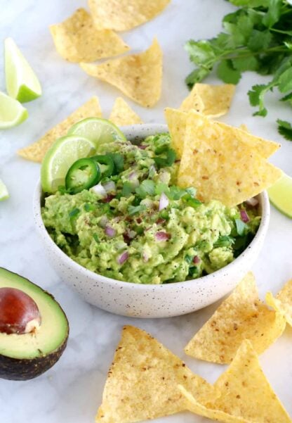 This is hands down the best guacamole recipe out there. Easy to make, with just 6 ingredients, this authentic guacamole is perfectly creamy, loaded with refreshing flavors, and always a hit at parties.