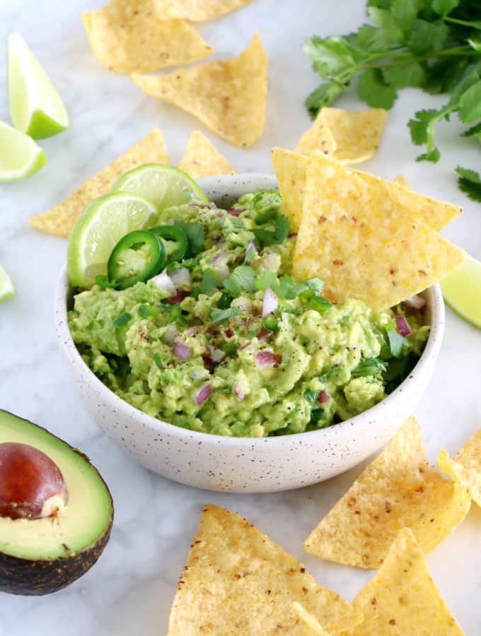 This is hands down the best guacamole recipe out there. Easy to make, with just 6 ingredients, this authentic guacamole is perfectly creamy, loaded with refreshing flavors, and always a hit at parties.