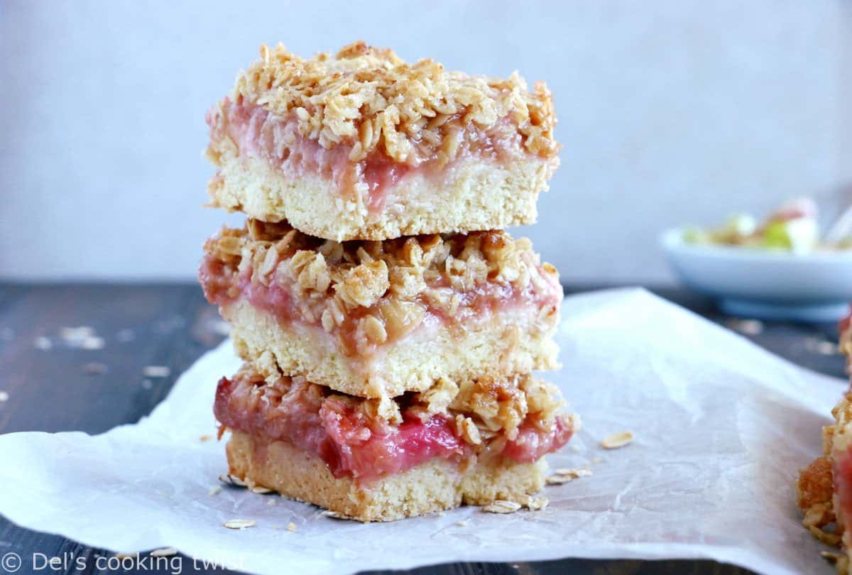 Rhubarb Crumble Bars are a must bake summer dessert recipe. They feature a thick and generous base, a juicy, sweet and tart rhubarb compote, and a crispy oat crumble on top.