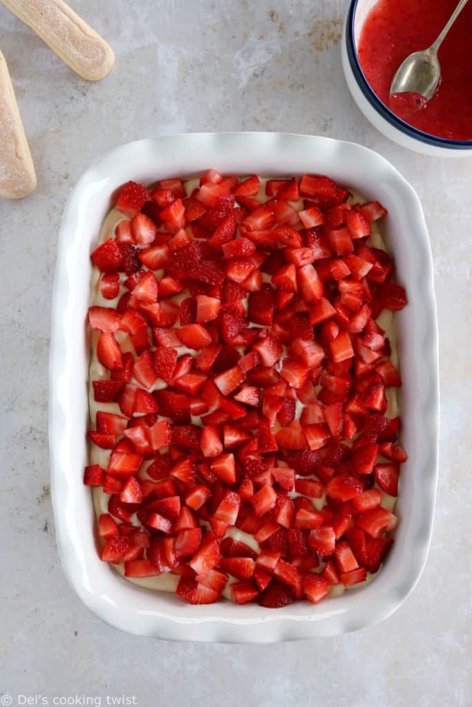 This strawberry tiramisu is made with fresh strawberries, soaked ladyfingers and a creamy mascarpone filling that doesn't contain raw eggs.