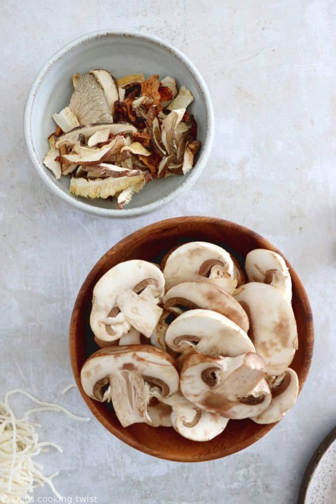 Here's a delicious tahini miso ramen with crispy tofu, sautéed mushrooms, soft boiled eggs, and a broth loaded with umami and slightly spicy flavors.