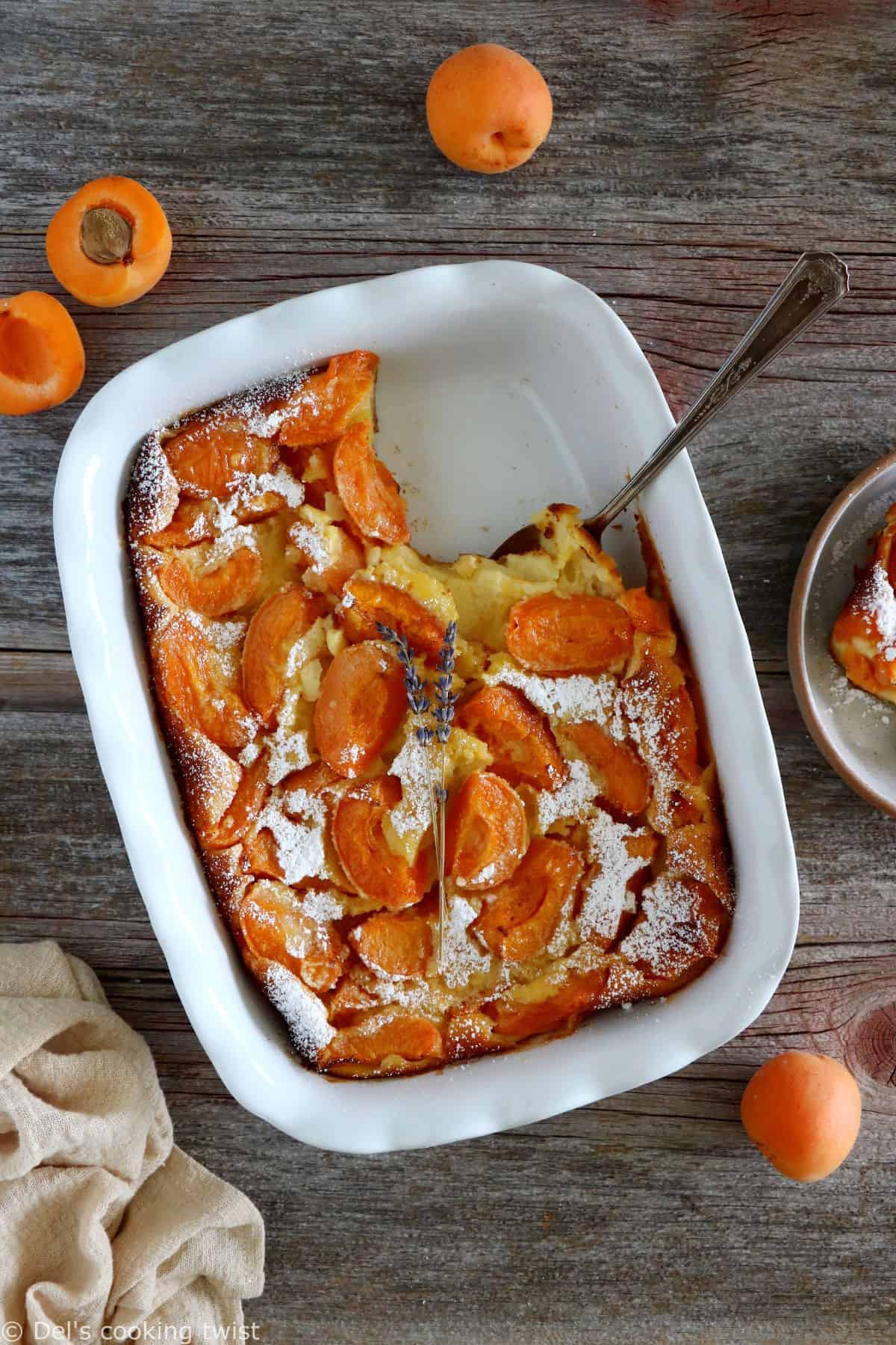 Apricot clafoutis is a timeless French dessert, consisting of a simple creamy custard base filled with fresh apricots.