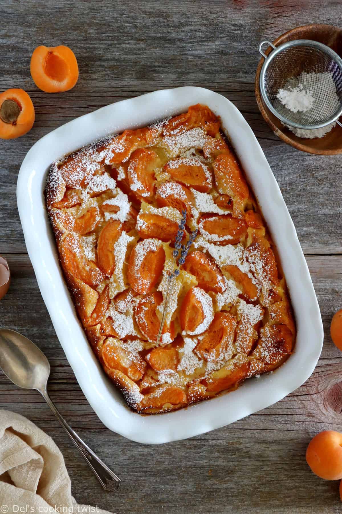 Apricot clafoutis is a timeless French dessert, consisting of a simple creamy custard base filled with fresh apricots.