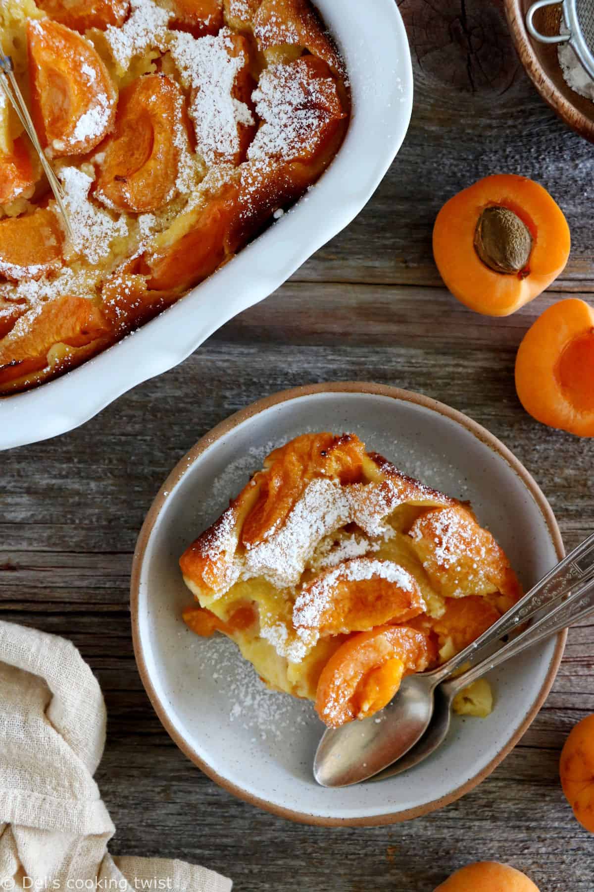 Apricot clafoutis is a timeless French dessert, consisting of a simple creamy custard base filled with fresh apricots.