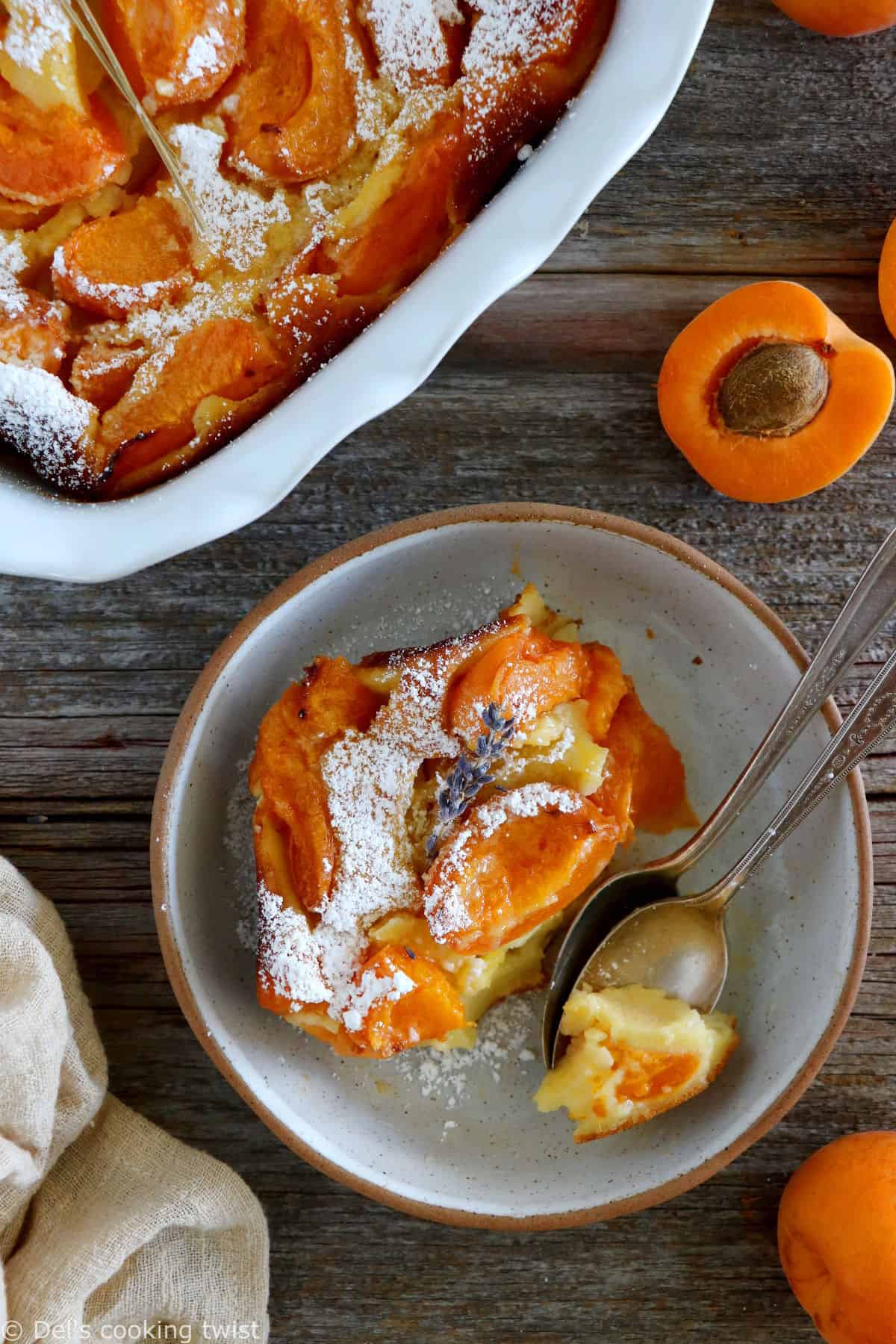 Apricot clafoutis is a timeless French dessert, consisting of a simple creamy custard base filled with fresh apricots.